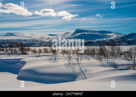 Spring time in the mountain area, plenty of snow, sunny weather and ice on the river, Stora sjöfallet nationalpark, Gällivare county, Swedish Lapland, Stock Photo