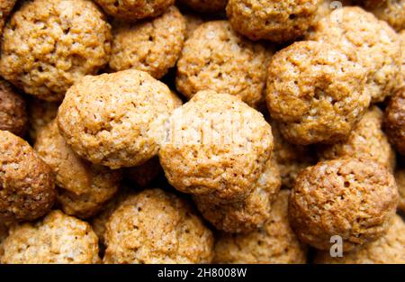 Close-up of a heap of home-made Dutch "Kruidnoten", small spiced biscuits or cookies enjoyed in the run up to and around the festival of Sinterklaas Stock Photo