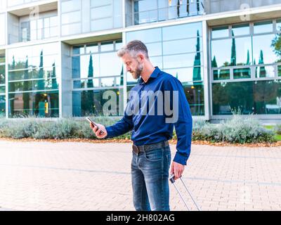 Digital luggage scale in luggage suitcase to avoid overweight baggage in  airport concept. Reduce traveling stress Stock Photo - Alamy