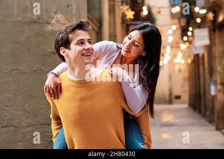 Couple enjoying time together outdoors on the street. Stock Photo