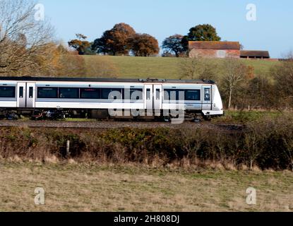 Chiltern Railways class 168 diesel train in autumn, Warwickshire, UK Stock Photo