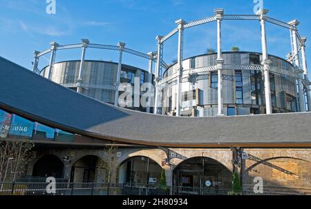 View of Gasholders apartments buildings next to Coal Drops Yard shopping centre near Granary Square in Kings Cross London N1C England UK  KATHY DEWITT Stock Photo