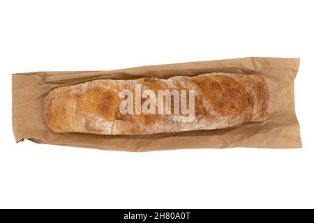 freshly baked delicious bread, whole wheat baguette on paper bag isolated on white background, healthy lifestyle, gluten free baked breads on delivery Stock Photo