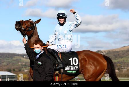 File photo dated 16-03-2021 of Rachael Blackmore onboard Honeysuckle celebrates after victory in the Unibet Champion Hurdle Challenge Trophy (Grade 1) during day one of the Cheltenham Festival at Cheltenham Racecourse. Honeysuckle faces nine rivals as she bids to win the Baroneracing.com Hatton's Grace Hurdle for the third year running at Fairyhouse on Sunday. Issue date: Friday November 26, 2021. Stock Photo