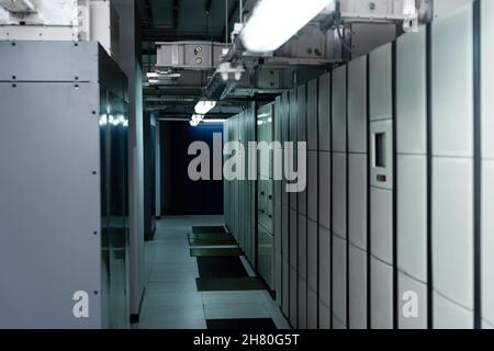 interior of data center with closed servers, cyber security concept Stock Photo