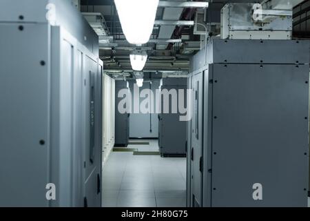 corridor in data center with closed servers, cyber security concept Stock Photo