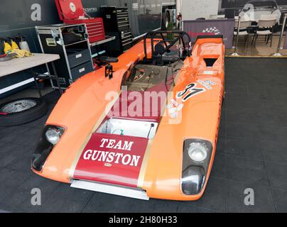 Gary Furst's Orange, 1971, Lola T212, in its pit garage, at the 2021 Silverstone Classic Stock Photo