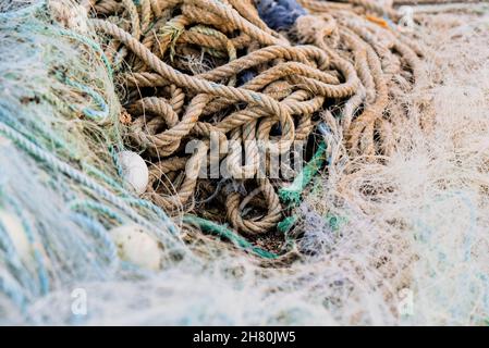 Old fishing nets and lines for fishing. Stock Photo
