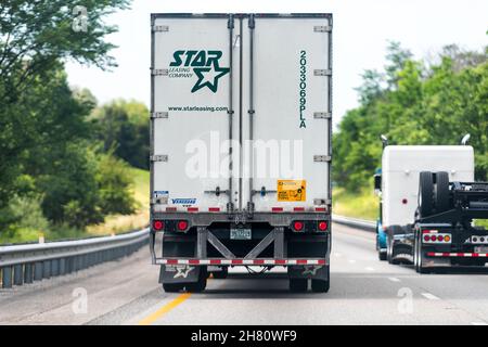 Lexington, USA - May 27, 2021: Highway interstate road in Virginia with truck vehicle for Star Leasing Company transport and sign for wide right turns Stock Photo