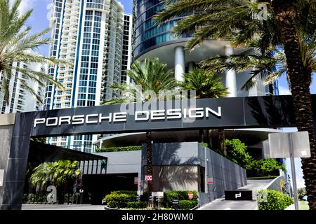 Sunny Isles Beach, USA - July 18, 2021: Modern building in North Miami, Florida with luxury hotel apartment condo building for Porsche Design with car Stock Photo