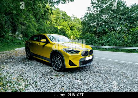 Russia Sochi 30 june 2021 BMW X2 New Golden Crossover in summer green Stock Photo