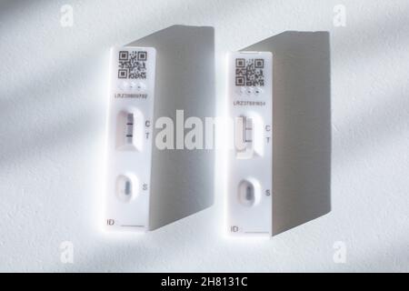 Two COVID-19 positive-reading lateral flow self-tests. Stock Photo
