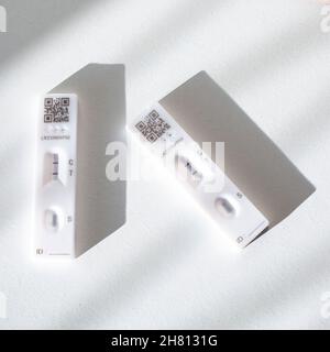 Two COVID-19 positive-reading lateral flow self-tests. Stock Photo