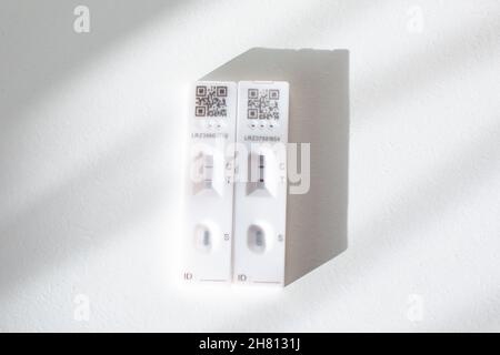 Two COVID-19 positive-reading lateral flow self-tests. Stock Photo