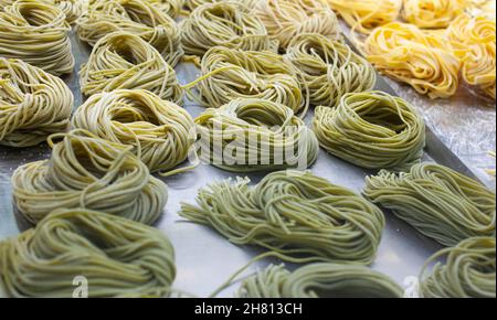 Close up of homemade italian pasta with spinach called vermicelli Stock Photo