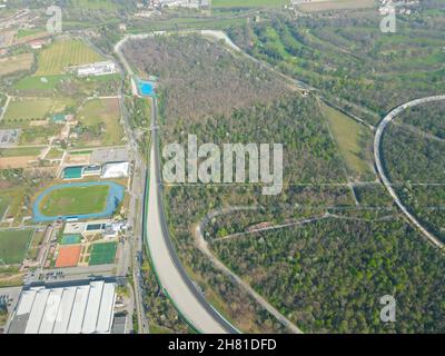 Aerial view of The Autodromo Nazionale of Monza, that is a race track located near the city of Monza, north of Milan, in Italy. Drone shot of Monza. Stock Photo