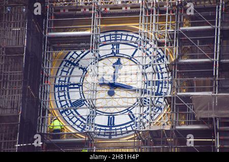London, UK. 26th November 2021. Workers renovate the clock face as refurbishment of Big Ben continues. The renovation of the iconic landmark is expected to be completed in 2022. Credit: Vuk Valcic / Alamy Live News Stock Photo