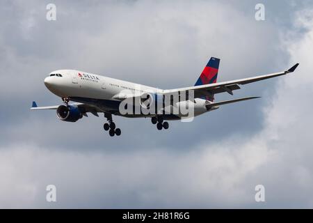 Amsterdam, Netherlands - August 14, 2014: Delta Airlines passenger plane at airport. Schedule flight travel. Aviation and aircraft. Air transport. Glo Stock Photo