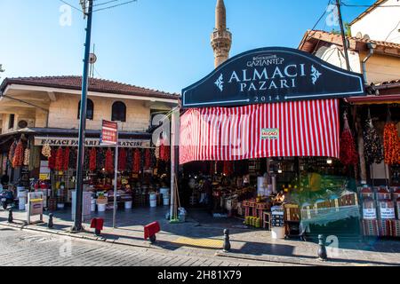 GAZIANTEP, TURKEY - OCTOBER 24, 2021: ALMACI BAZAAR in Gaziantep (Turkish: Almaci Pazari). Historical shopping center. Local and organic products. Stock Photo
