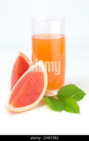 Grapefruit juice with slices ripe isolated on white background cutout Stock Photo