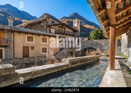 The picturesque village of Chianale during fall season, in the Varaita Valley, Piedmont, northern Italy. Stock Photo