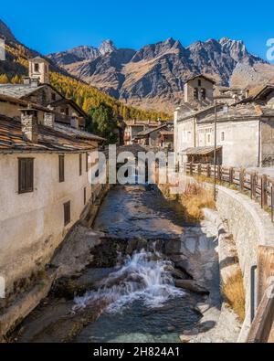 The picturesque village of Chianale during fall season, in the Varaita Valley, Piedmont, northern Italy. Stock Photo
