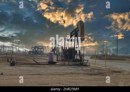 Moody light hovers over the Lost Hills oil field north west of Bakersfield  in California. Stock Photo