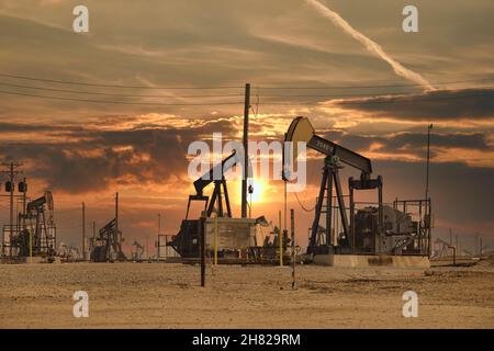 Moody light hovers over the Lost Hills oil field north west of Bakersfield  in California. Stock Photo