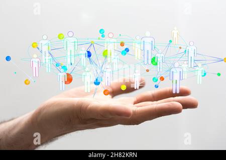 Hologram of social networking concept on a man's palm Stock Photo