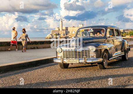 Vintage American car from the 50s driving through the streets of Havana, Cuba Stock Photo