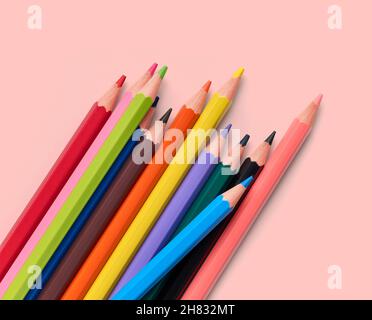 wooden color pencils isolated on pink background, top view Stock Photo