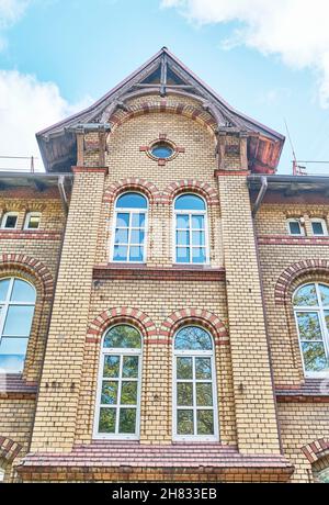 Building built in late 19th century of yellow clinker brick. Kaliningrad, Russia Stock Photo