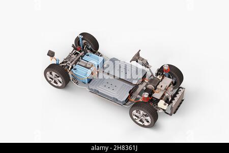 Electric car under carriage chassis. All main details of EV system, on white background. Stock Photo