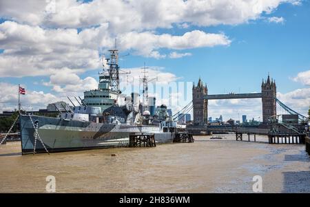 London, UK - 7th June 2017: HMS Belfast, a World War Two battleship, and Tower Bridge as seen from Southbank on the river Thames. London, UK. Stock Photo