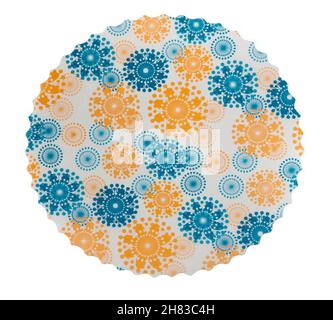 Round paper confectionery napkin with fireworks pattern isolated over white background Stock Photo