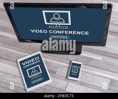 Video conference concept shown on different information technology devices Stock Photo