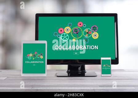 Collaboration concept shown on different information technology devices Stock Photo