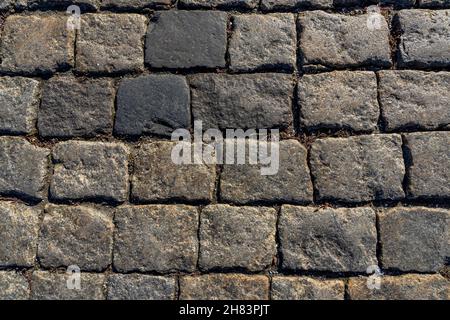 Grey paving stone texture on Red Square in Moscow, pedestrian walkway. Top view. Cement brick squared stone floor background. Concrete paving slabs. H Stock Photo