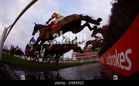 Runners and riders during the the Ladbrokes Trophy Handicap Chase at ...