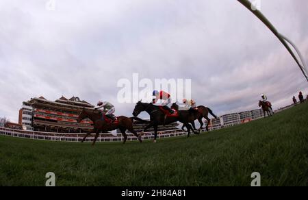 Runners and riders during the the Ladbrokes Trophy Handicap Chase at ...