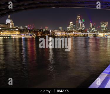 A view of the city of London skyline at night showing station Pauls cathedral, the wale talkie and the cheesgrater. Stock Photo