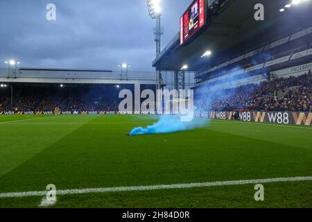 27th November 2021;  Selhurst Park, Crystal Palace, London, England;  Premier League football, Crystal Palace versus Aston Villa: A flare on the pitch thrown by an Aston Villa fan after Targett scored in the 15th minute going up 1-0. Stock Photo