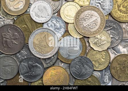 Directly above close-up of the coins from around the World. Stock Photo