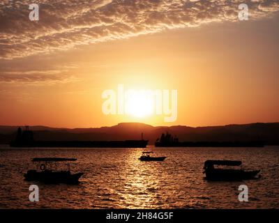 Scenic view at sunset from Aqaba Port , Jordan. Sunset on the Red Sea Stock Photo