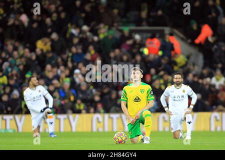 Norwich, UK. 27th Nov, 2021. Mathias Normann of Norwich City (M) takes the knee prior to kick off. Premier League match, Norwich City v Wolverhampton Wanderers at Carrow Road in Norwich on Saturday 27th November 2021. this image may only be used for Editorial purposes. Editorial use only, license required for commercial use. No use in betting, games or a single club/league/player publications. pic by Steffan Bowen/Andrew Orchard sports photography/Alamy Live news Credit: Andrew Orchard sports photography/Alamy Live News Stock Photo
