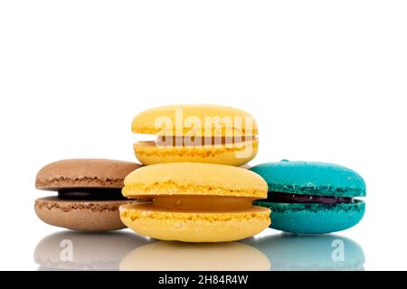 Several sweet macaroons, close-up, isolated on white. Stock Photo