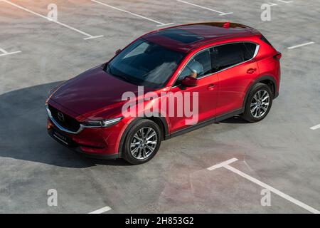 Kyiv, Ukraine - June 30, 2021: Red Mazda CX-5 at parking lot in the city Stock Photo