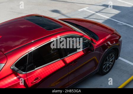 Kyiv, Ukraine - June 30, 2021: Red Mazda CX-5 at parking lot, view from above Stock Photo