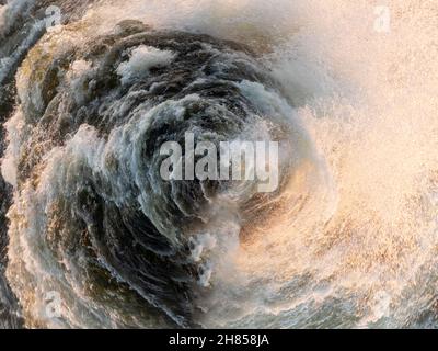 Water sea swirling spherical background. Rough water in the whirlpool Stock Photo