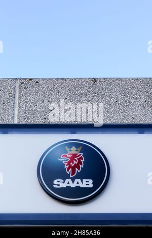 Risskov, Denmark - January 17, 2016: Saab logo on a wall. Saab was a manufacturer of automobiles that was founded in Sweden in 1945 Stock Photo